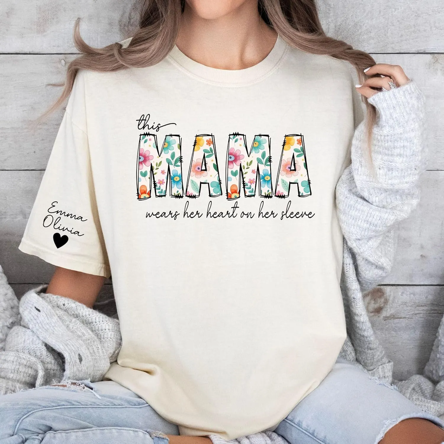 Personalized Mama Shirts for Women Custom Mom Shirt with Kids Names on Sleeve This Mama Wears Her Heart on Her Sleeve Mothers Day Gifts for Mom T-Shirt Mom Birthday Gifts for Women
